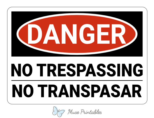 Bilingual English and Spanish No Trespassing Danger Sign