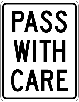 Pass with Care Sign